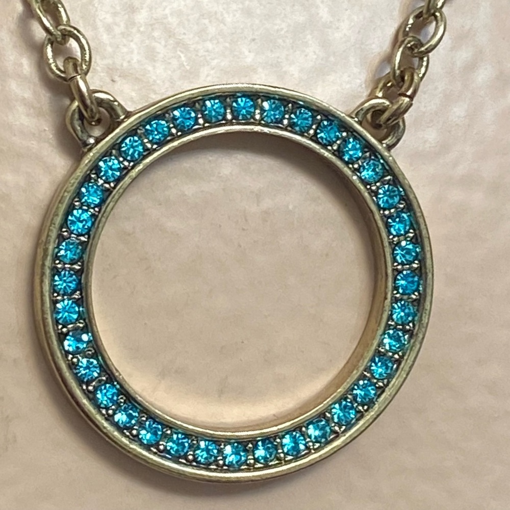 Heidi Daus vintage gold tone blue Swarovski Crystal circle necklace. Used